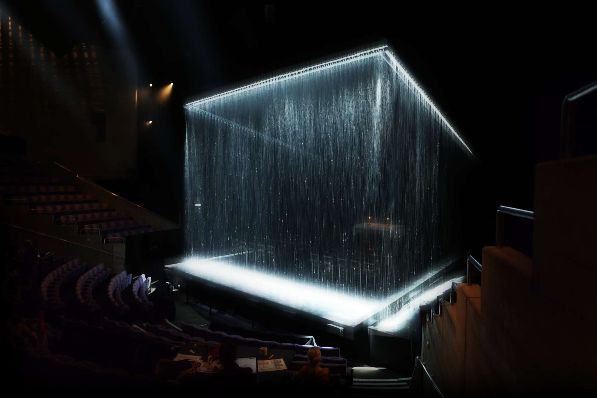 The Crucible set design by Es Devlin features cyclical rain installation